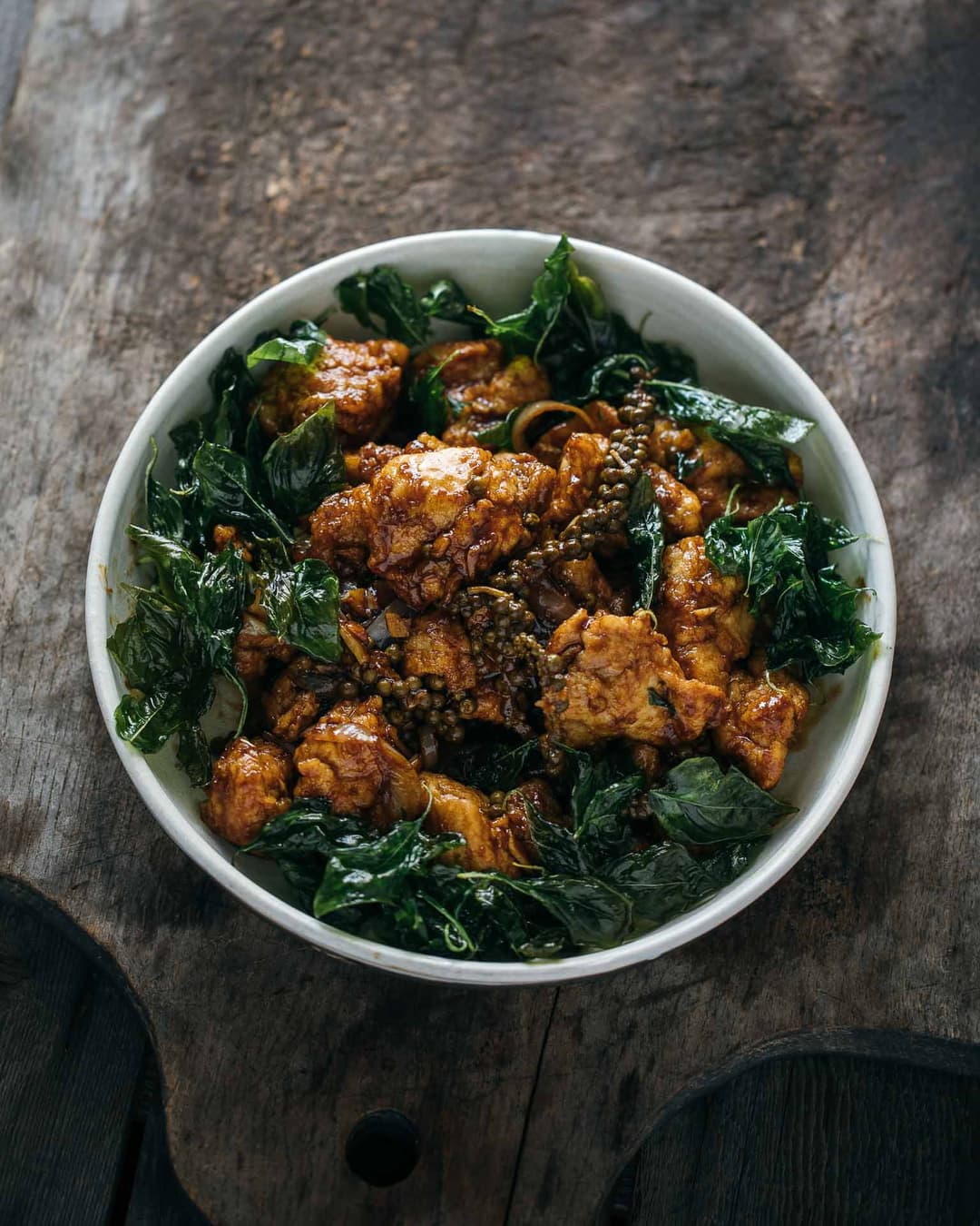 Green peppercorn chicken with crispy basil Green peppercorn chicken with crispy basil