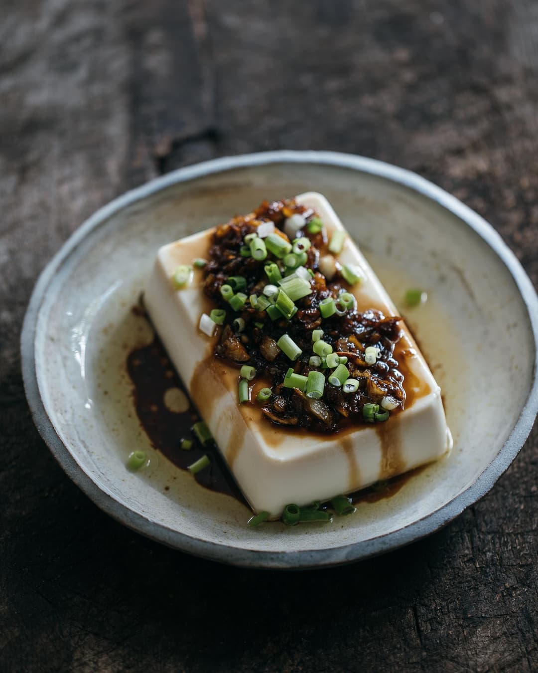 Silken tofu with onion, garlic and soy sauce Silken tofu with onion, garlic and soy sauce